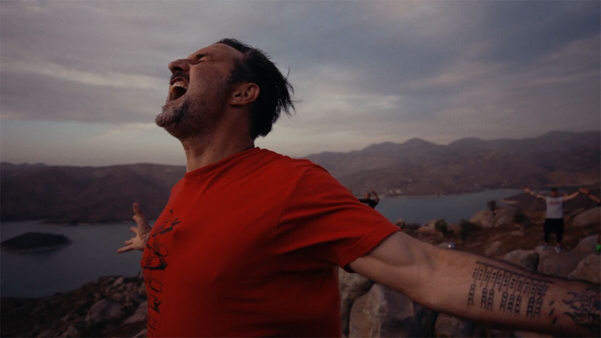 David Arquette screams in triumph in a scene from "You Cannot Kill David Arquette."