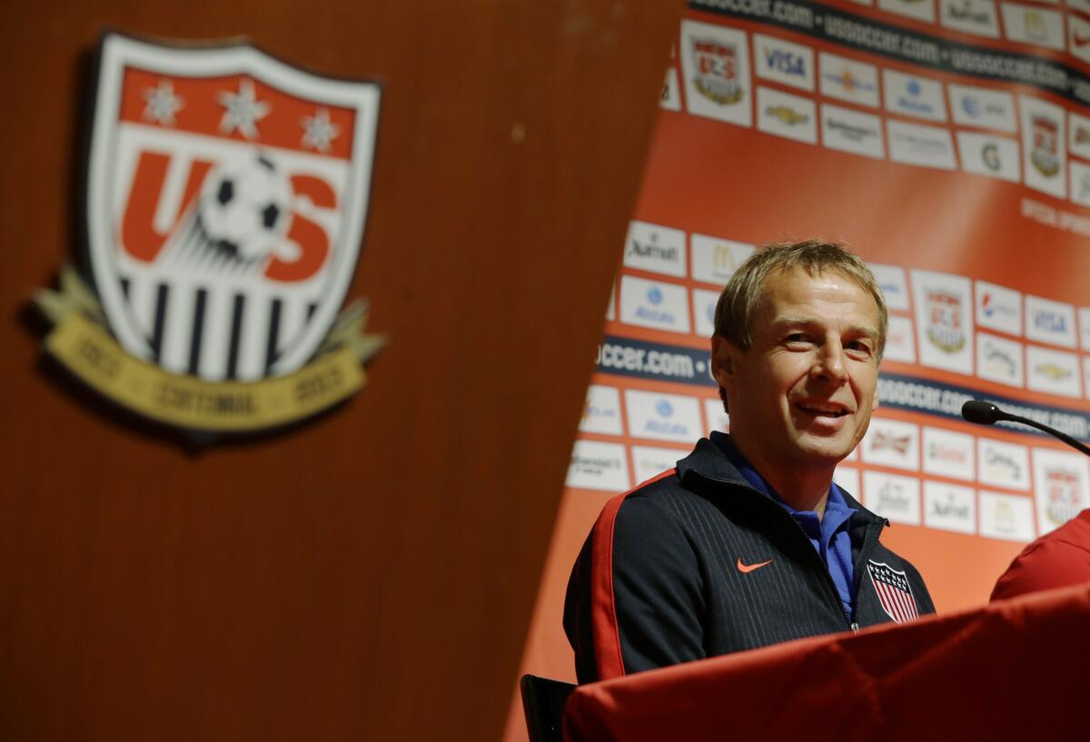 U.S. national soccer team head coach Jurgen Klinsmann talks to reporters on June 10, 2013, in Seattle.