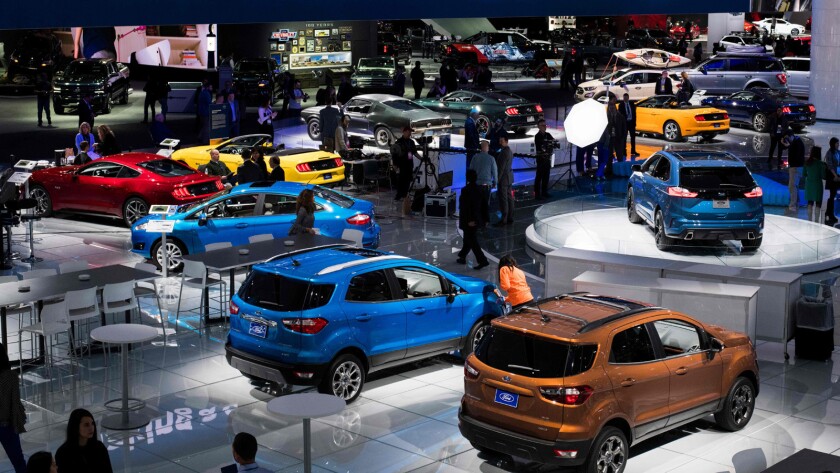 People visit the Ford exhibit at the 2018 North American International Auto Show in Detroit in January.