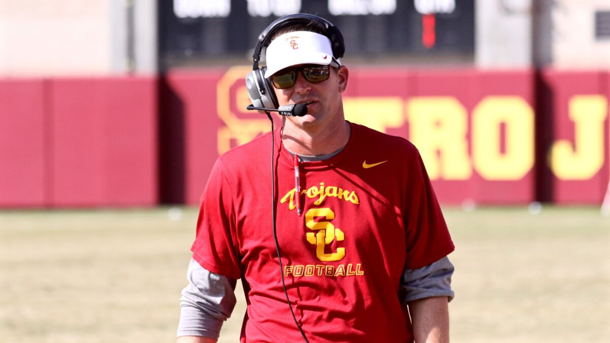 Former USC defensive coordinator Justin Wilcox calls a play during a fall scrimmage at Howard Jones Field.