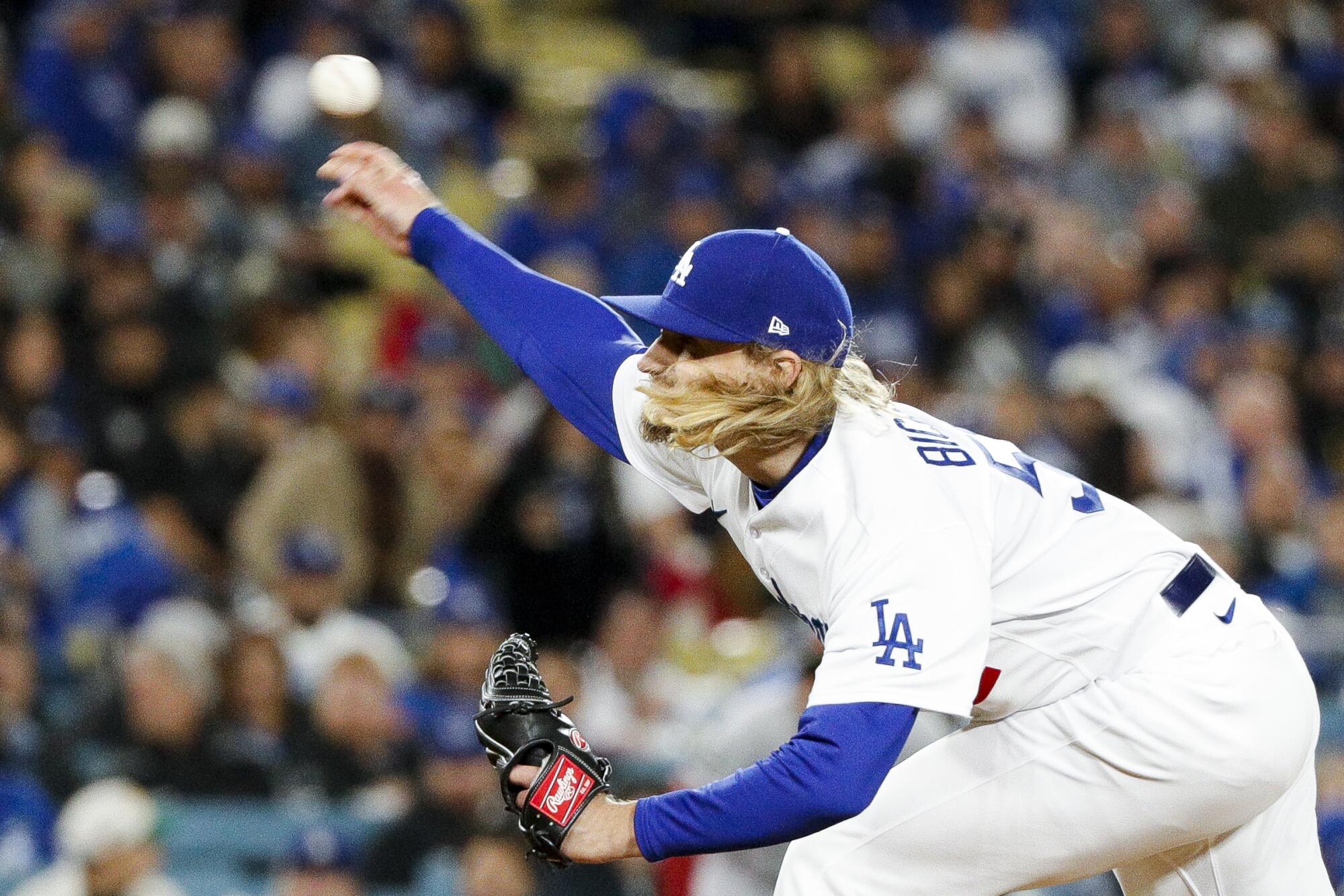 Dodgers relief pitcher Phil Bickford delivers during the seventh inning against the Arizona Diamondbacks.