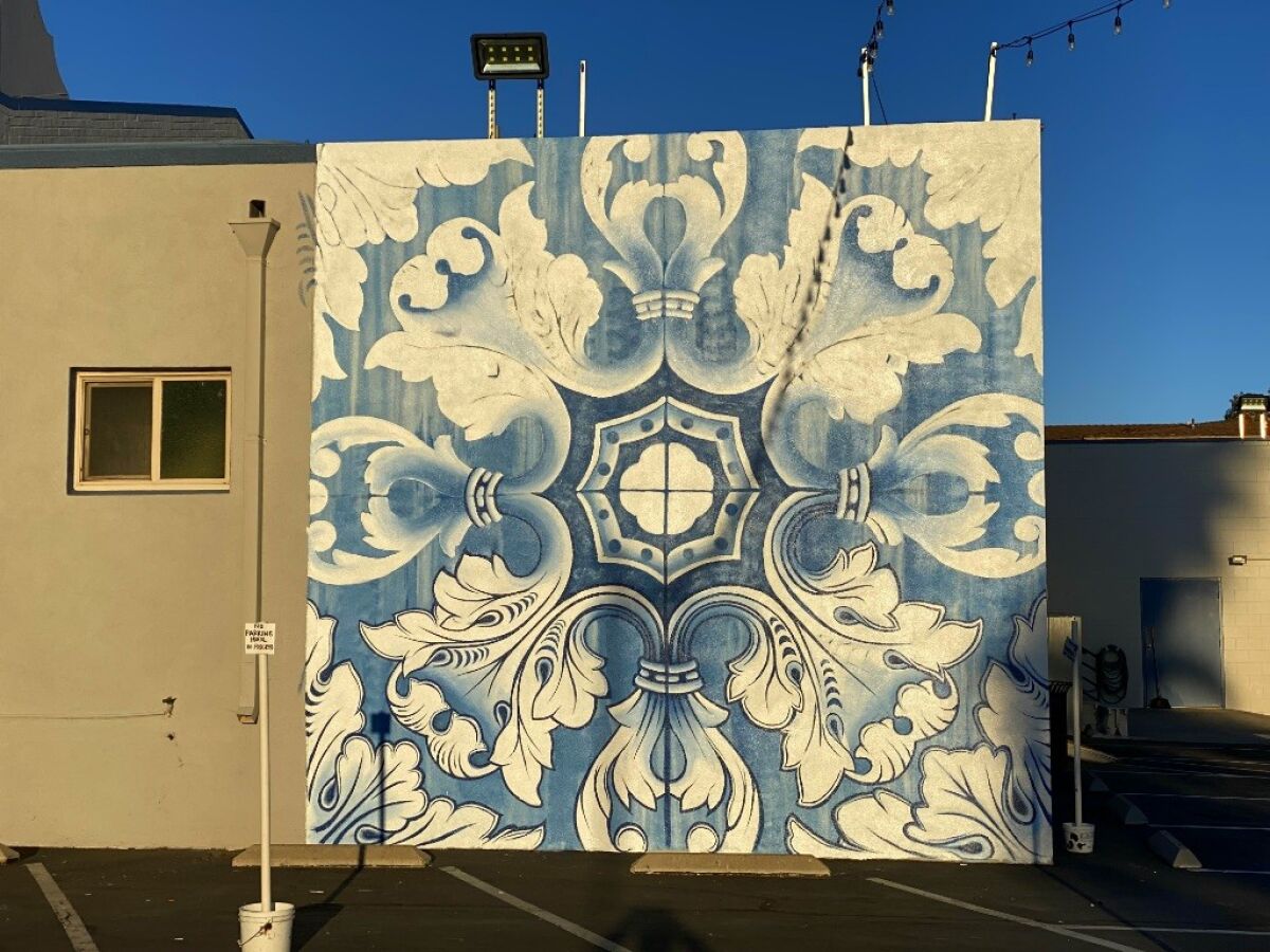 This new mural, part of the Point Loma Association's Mural Project, occupies an exterior wall at the Portuguese Hall.