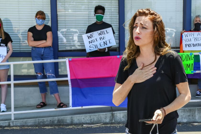 SAN DIEGO, CA - JULY 10: Loxie Gant, an institutional child abuse expert, advocates for victims during a protest outside of the Christian Youth Theater in El Cajon on Friday, July 10, 2020 in San Diego, CA. (Jarrod Valliere / The San Diego Union-Tribune)