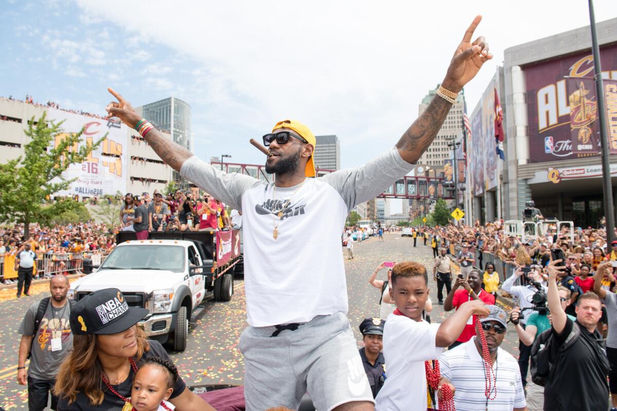 LeBron James celebrates the Cavaliers' championship with the city of Cleveland.