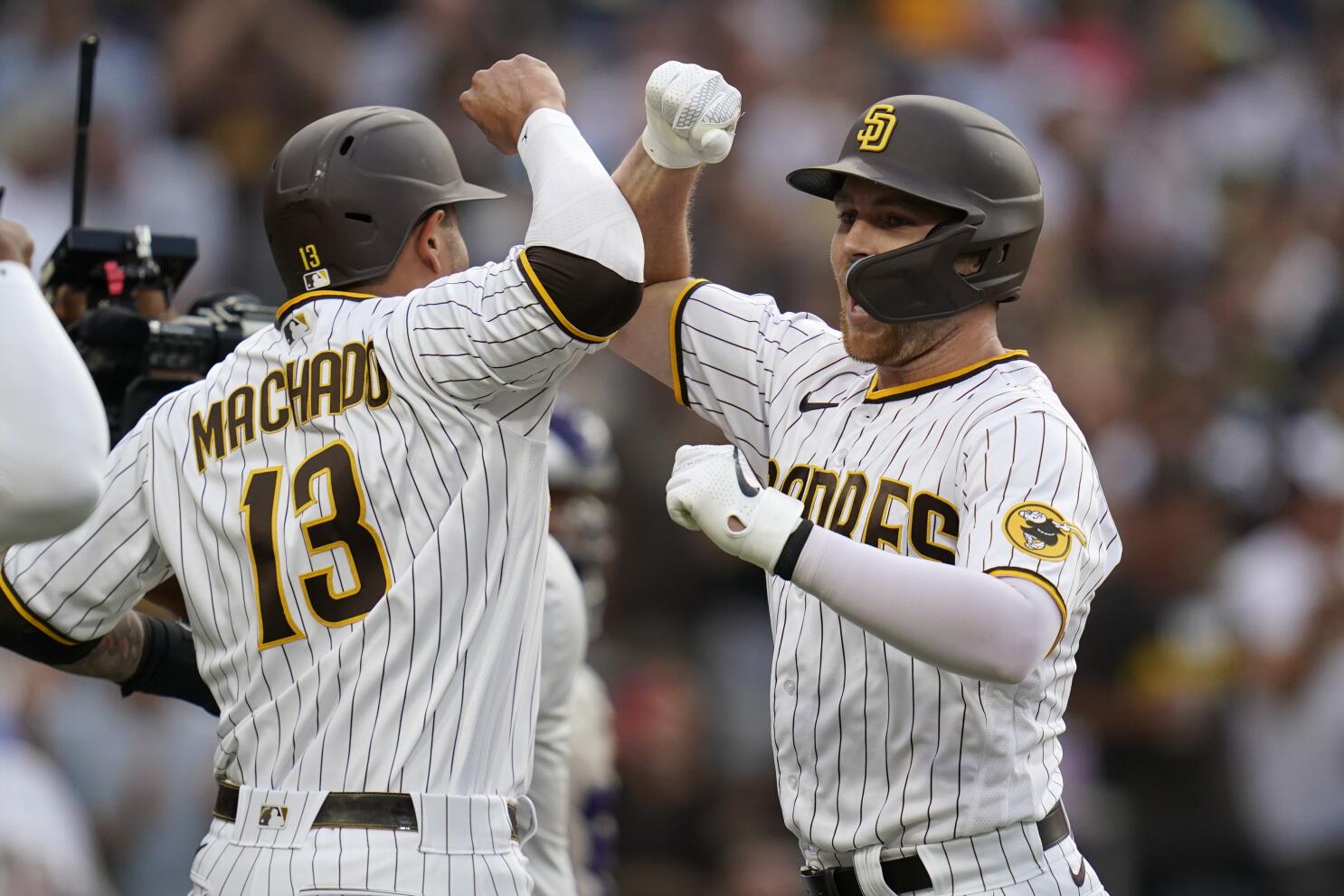 SAN FRANCISCO, CA - AUGUST 29: San Diego Padres players pose for a photo to  celebrate a home run hit by first basemen Brandon Drury (17) in the first  inning during a