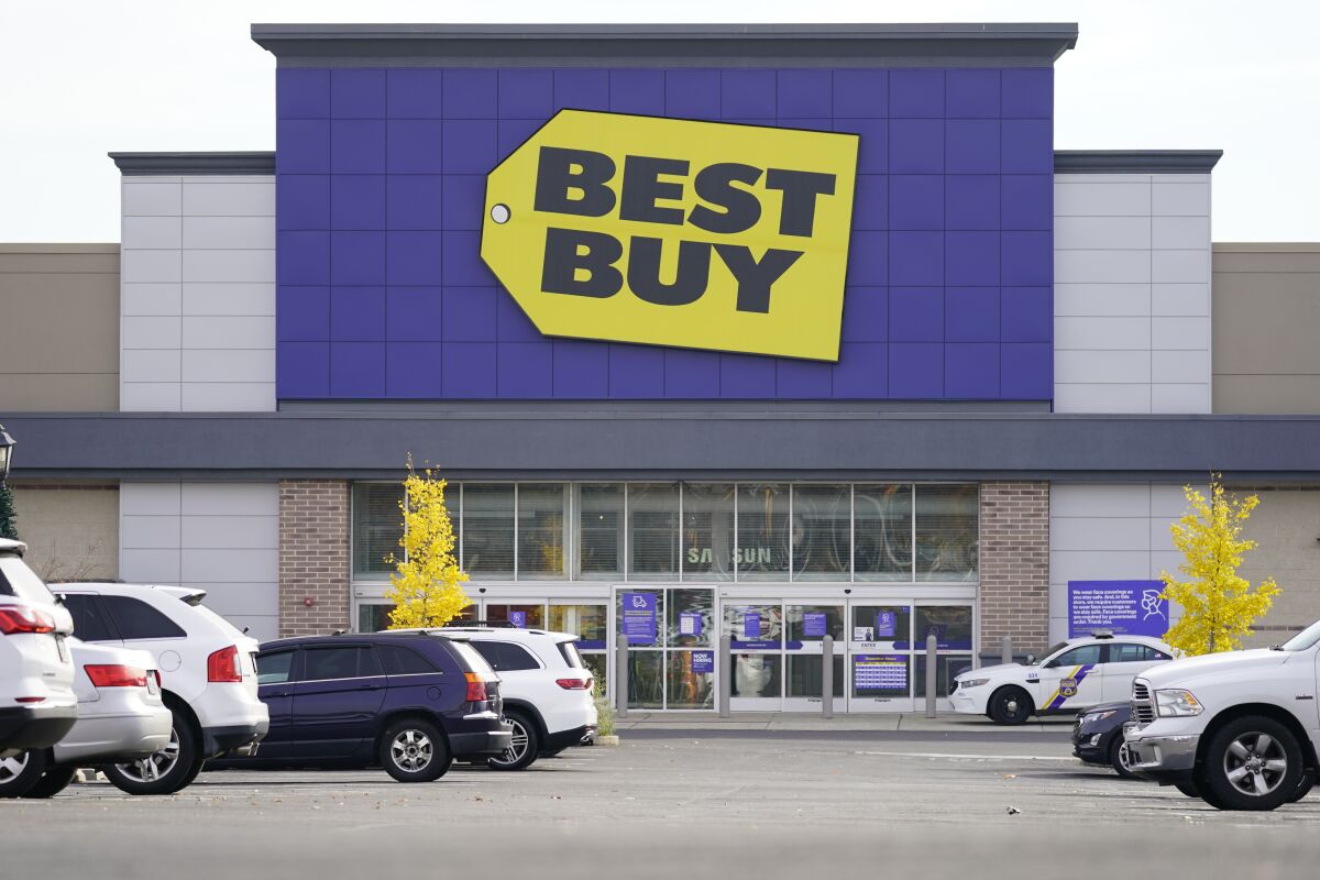 Shown is a Best Buy location in Philadelphia, Wednesday, Nov. 17, 2021. Best Buy reported a shortfall in sales for the holiday quarter, Thursday, March 3, 2022, as the nation’s largest electronics chain struggled with limited supplies of holiday products and was forced to reduce store hours because of a shortage of workers due to omicron. (AP Photo/Matt Rourke)