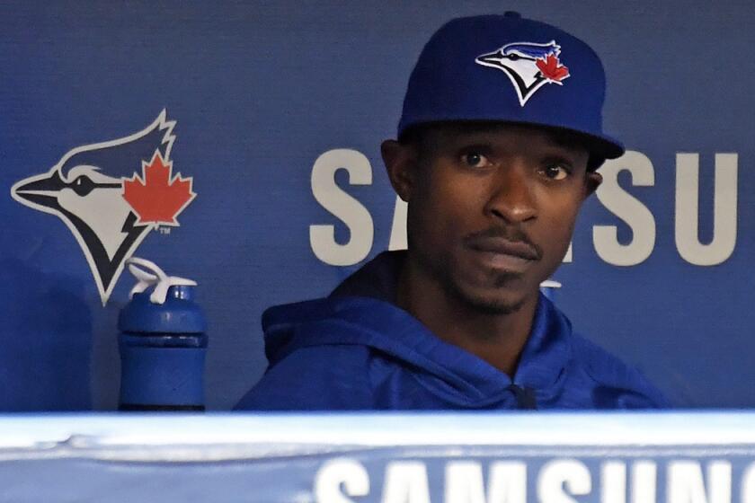 Toronto Blue Jays' Melvin Upton Jr., who recently joined the team, sits on the bench as the Blue Jays played the San Diego Padres on Tuesday.