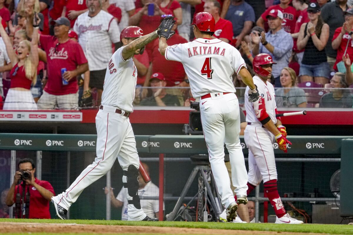 Cincinnati Reds' Jesse Winker bats during the fourth inning of