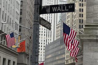 American flags hang from the front the New York Stock Exchange, right, on Thursday, April 11, 2024 in New York. Shares in Europe and Asia are mostly lower after U.S. stocks fell following another release of hotter than expected inflation data. (AP Photo/Peter Morgan)