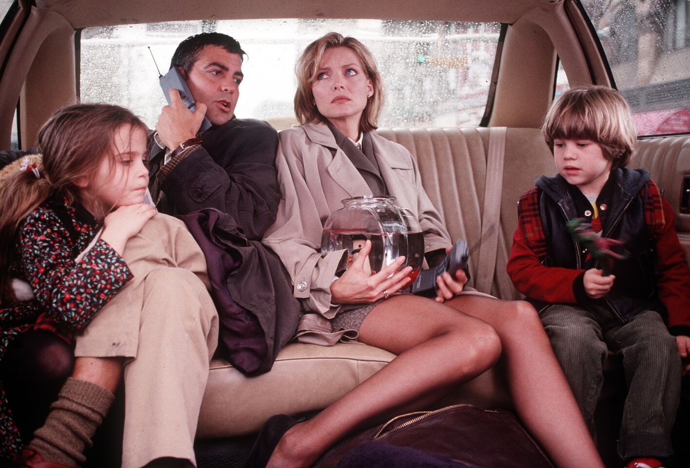 Clooney then starred in a comedy chronicling two single working parents (Michelle Pfeiffer and Clooney) and their children, who encounter a day full of surprises.