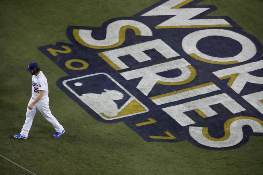 LOS ANGELES, CALIF. --WEDNESDAY, NOV. 1, 2017: Dodgers ace pitcher Clayton Kershaw leaves the mound in the third inning as the Dodgers lose to the Astros 5-1 in Game 7 of World Series at Dodger Stadium Wednesday, Nov. 1, 2017. (Allen J. Schaben / Los Angeles Times)