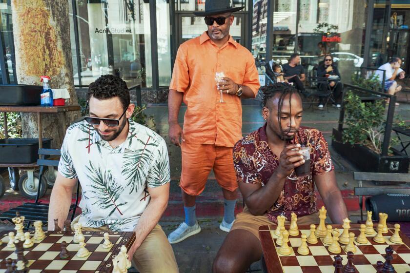 Participants play chess at DTLA Chess located at ilCaffe 855 S Broadway, Los Angeles.