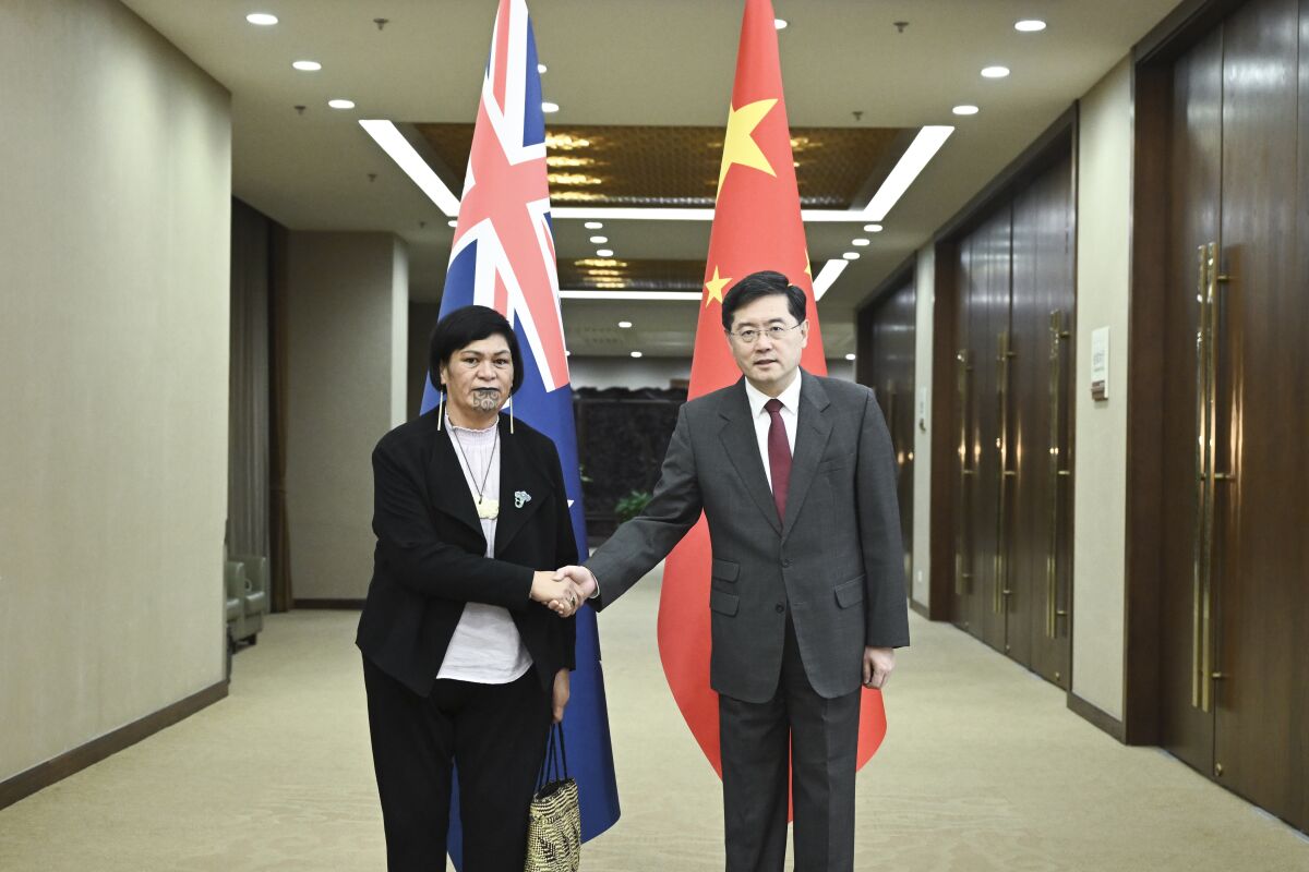 In this photo released by Xinhua News Agency, Chinese Foreign Minister Qin Gang, right, meets with visiting New Zealand Foreign Minister Nanaia Mahuta in Beijing on Friday, March 24, 2023. Mahuta has expressed concern to China over any provision of lethal aid to support Russia in its war against Ukraine during a meeting with her Chinese counterpart. (Yan Yan/Xinhua via AP)