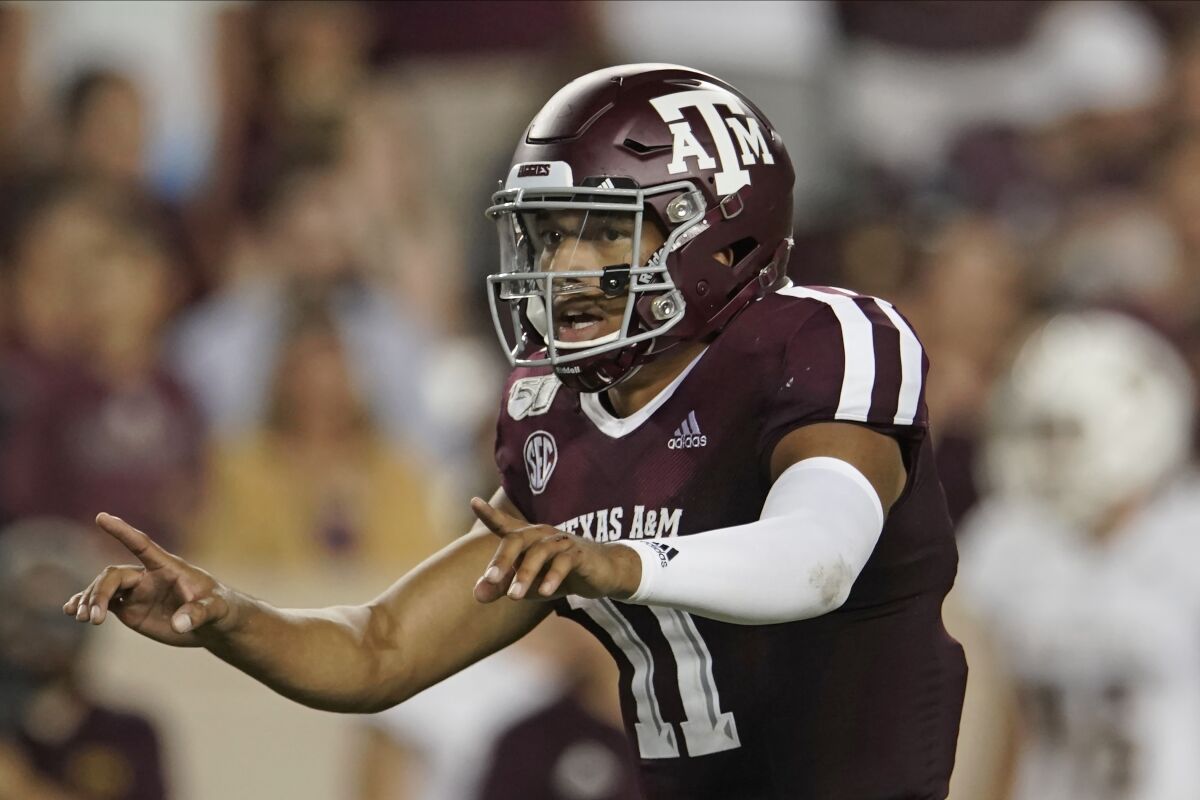 FILE - In this Aug. 29, 2019, file photo, Texas A&M's Kellen Mond (11) directs his team against Texas State during the second half of an NCAA college football game, in College Station, Texas. As Jimbo Fisher enters his third season at Texas A&M he has a luxury afforded to very few coaches: a four-year starter at quarterback in Kellen Mond. Mond is one of the most experienced quarterbacks in the nation this season after starting 36 games in his first three seasons with the Aggies. (AP Photo/Chuck Burton, File)