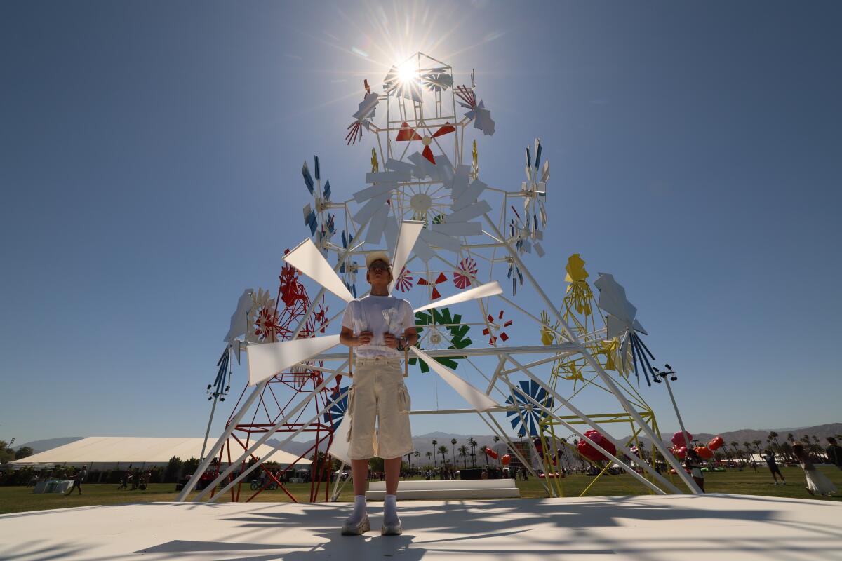 Chuchi Janes stands successful beforehand of the creation installation Take Fly.