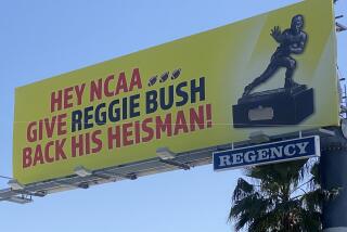 A billboard demanding the return of Reggie Bush's Heisman Trophy on White Oak and Ventura Blvd in Encino on April 26, 2023.