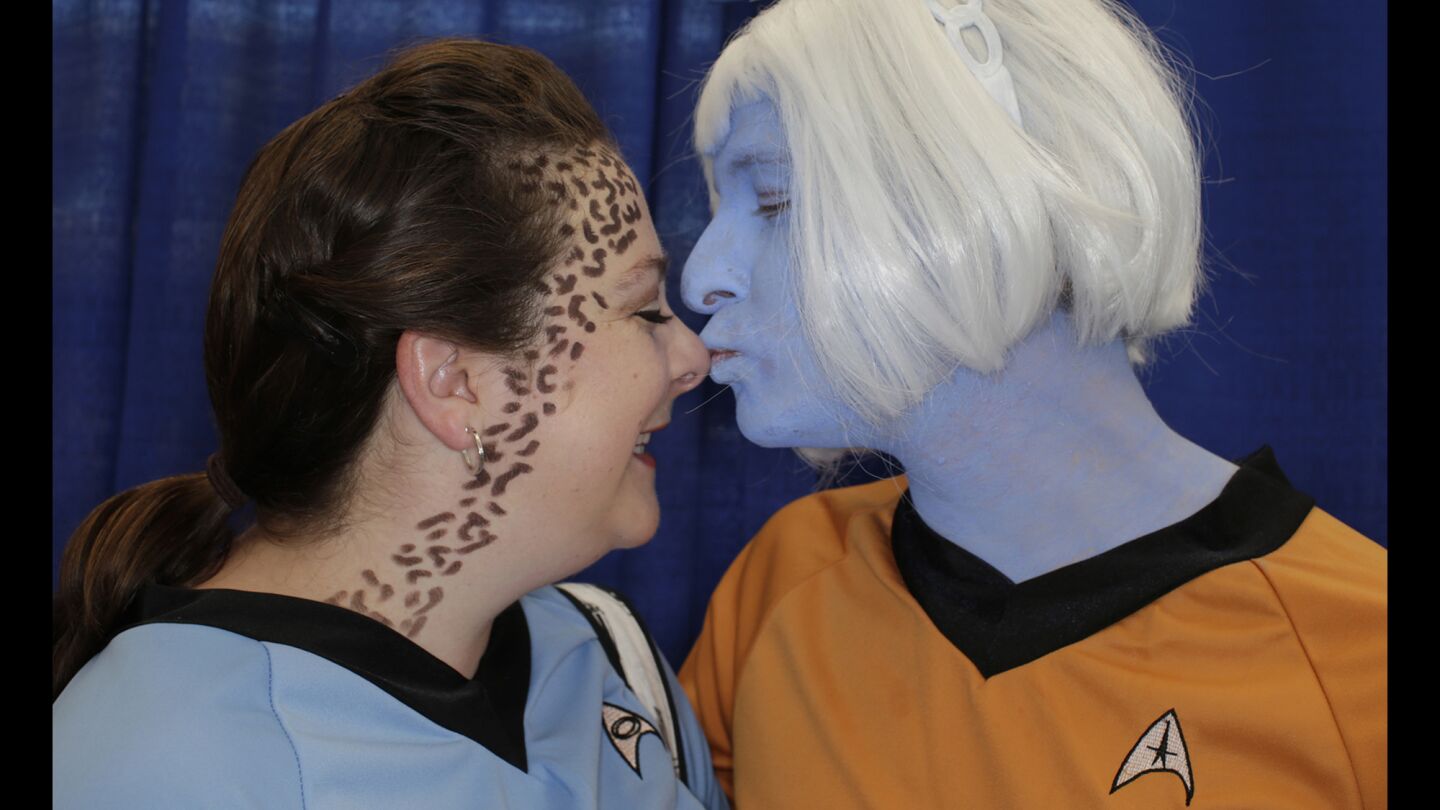 Cosplayers Daniel Klein as an Andorian, right, and Katelyn Sobotka as a Trill at Comic-Con.