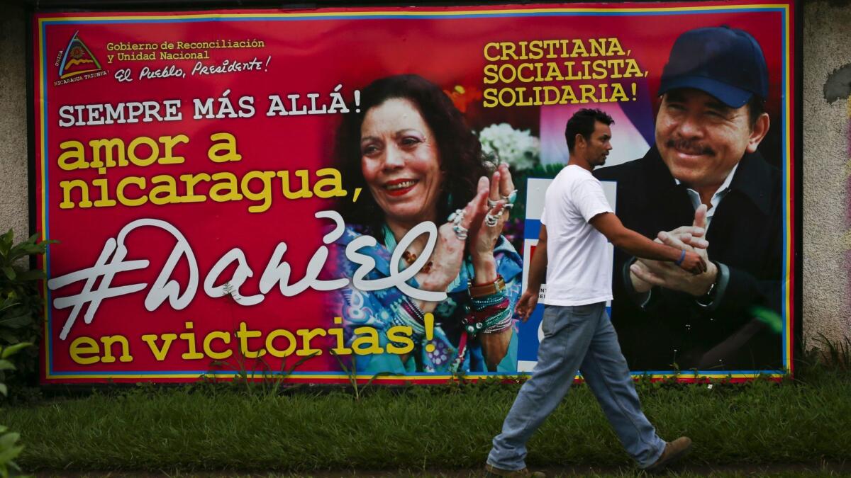 A billboard in Managua promotes Nicaraguan President Daniel Ortega, who is seeking reelection, and his running mate and wife, Rosario Murillo.