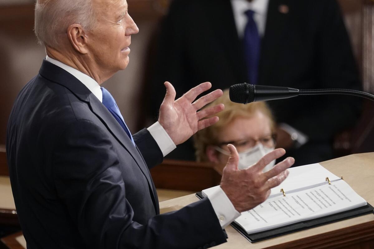 President Biden gestures as he speaks to a joint session of Congress.