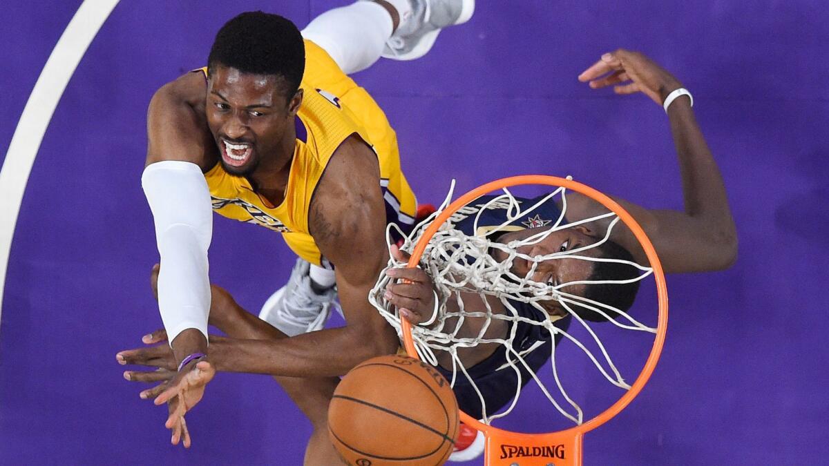 Lakers guard David Nwaba shoots as New Orleans forward Cheick Diallo defends on April 11.