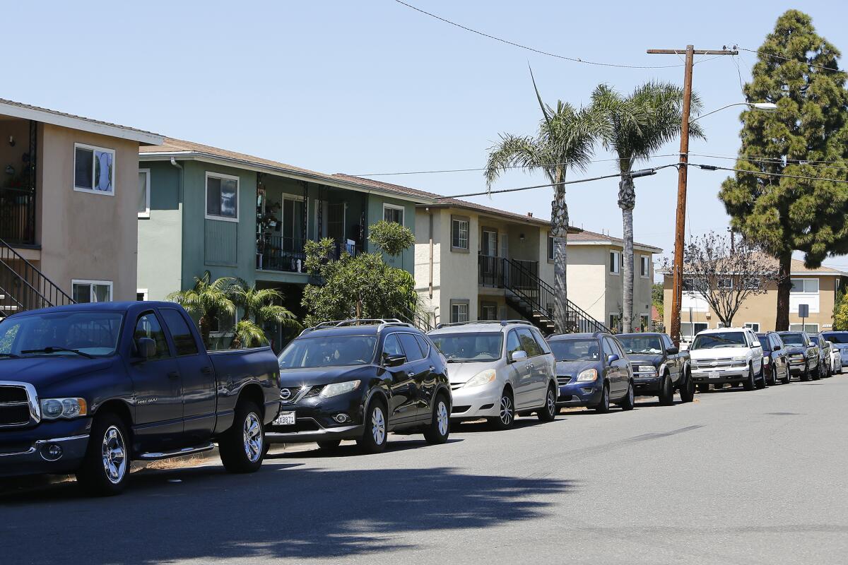 Vehicles parked along Koledo Lane in the Oak View neighborhood of Huntington Beach. 