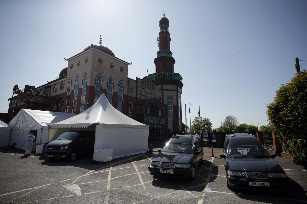 A makeshift morgue set in the parking lot of a mosque in Birmingham, England 