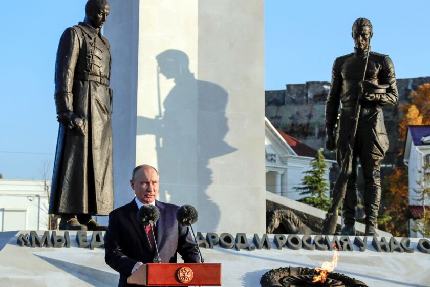Russian President Vladimir Putin delivers his speech at the memorial complex dedicated to the end of the Russian Civil War during marking Unity Day in Sevastopol, Crimea, Thursday, Nov. 4, 2021. (AP Photo/Mikhail Metzel)