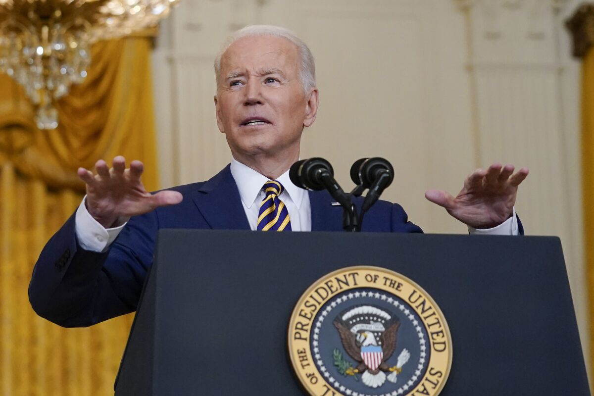 President Biden speaks during a news conference at the White House on Jan. 19.