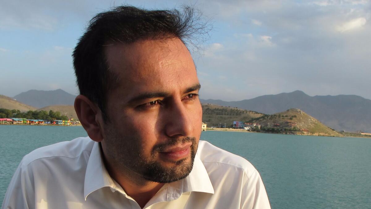 Zabihullah Tamanna at the Qargha Lake on the outskirts of Kabul on July 10, 2014.