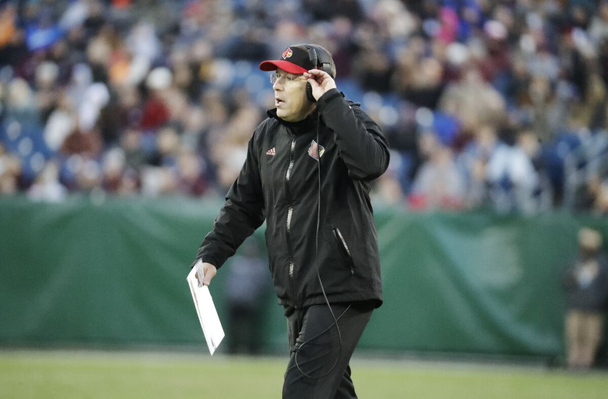 Louisville coach Scott Satterfield watches from the sideline