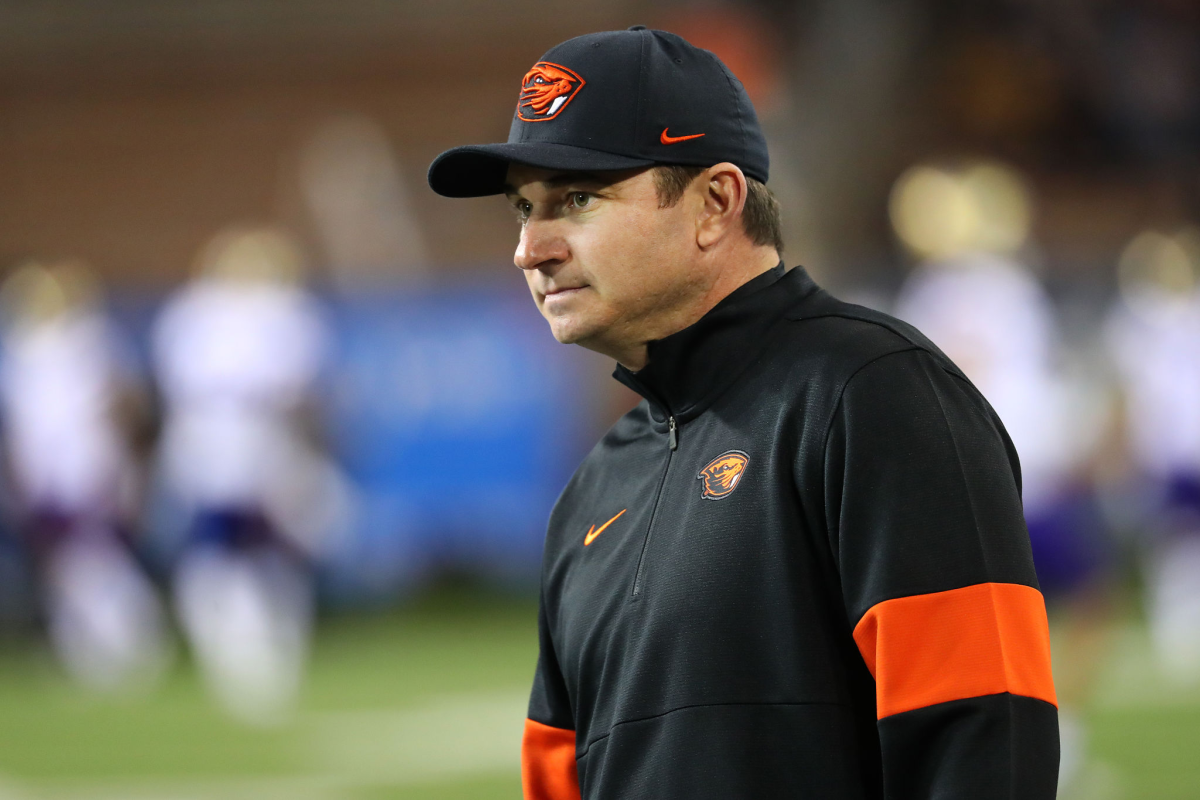 Oregon State coach Jonathan Smith looks on before a game.