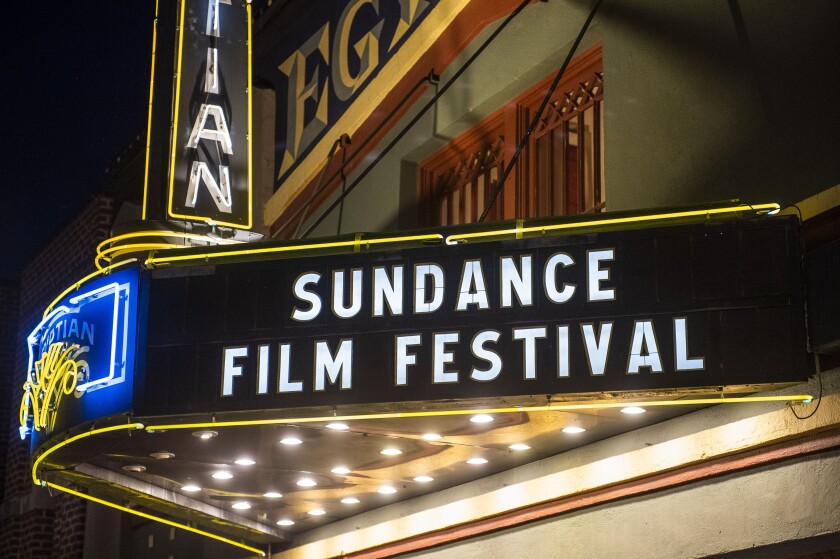FILE - The marquee of the Egyptian Theatre appears during the Sundance Film Festival in Park City, Utah on Jan. 28, 2020. The Sundance Film Festival is cancelling its in-person festival and reverting to an entirely virtual edition due to the current coronavirus surge. Festival organizers announced Wednesday, Jan 5, 2022, that the festival will start as scheduled on Jan. 20, but will shift online. Last year's Sundance was also held virtually because of the pandemic. (Photo by Arthur Mola/Invision/AP, File)