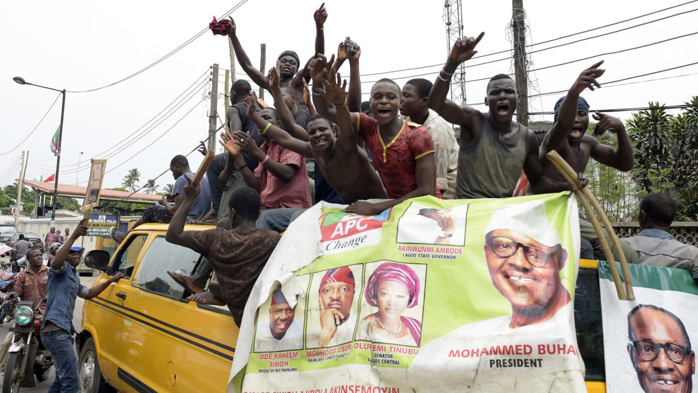 Supporters of newly elected Nigerian President Muhammadu Buhari celebrate in Lagos on Wednesday.