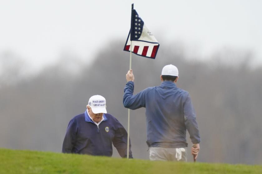 President Donald Trump plays golf at Trump National Golf Club in Sterling, Va., Sunday, Nov. 22, 2020. (AP Photo/Manuel Balce Ceneta)