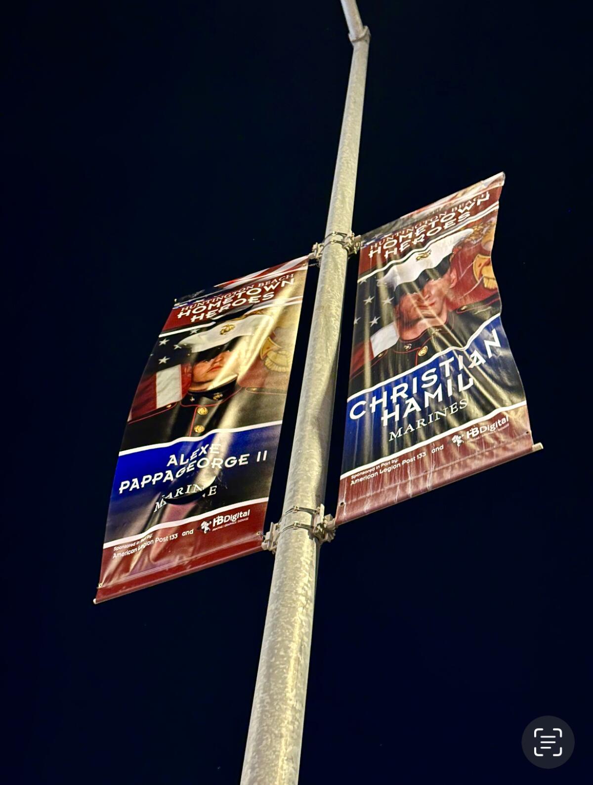 The banner honoring U.S. Marine Alexe Pappageorge Jr. in Huntington Beach.