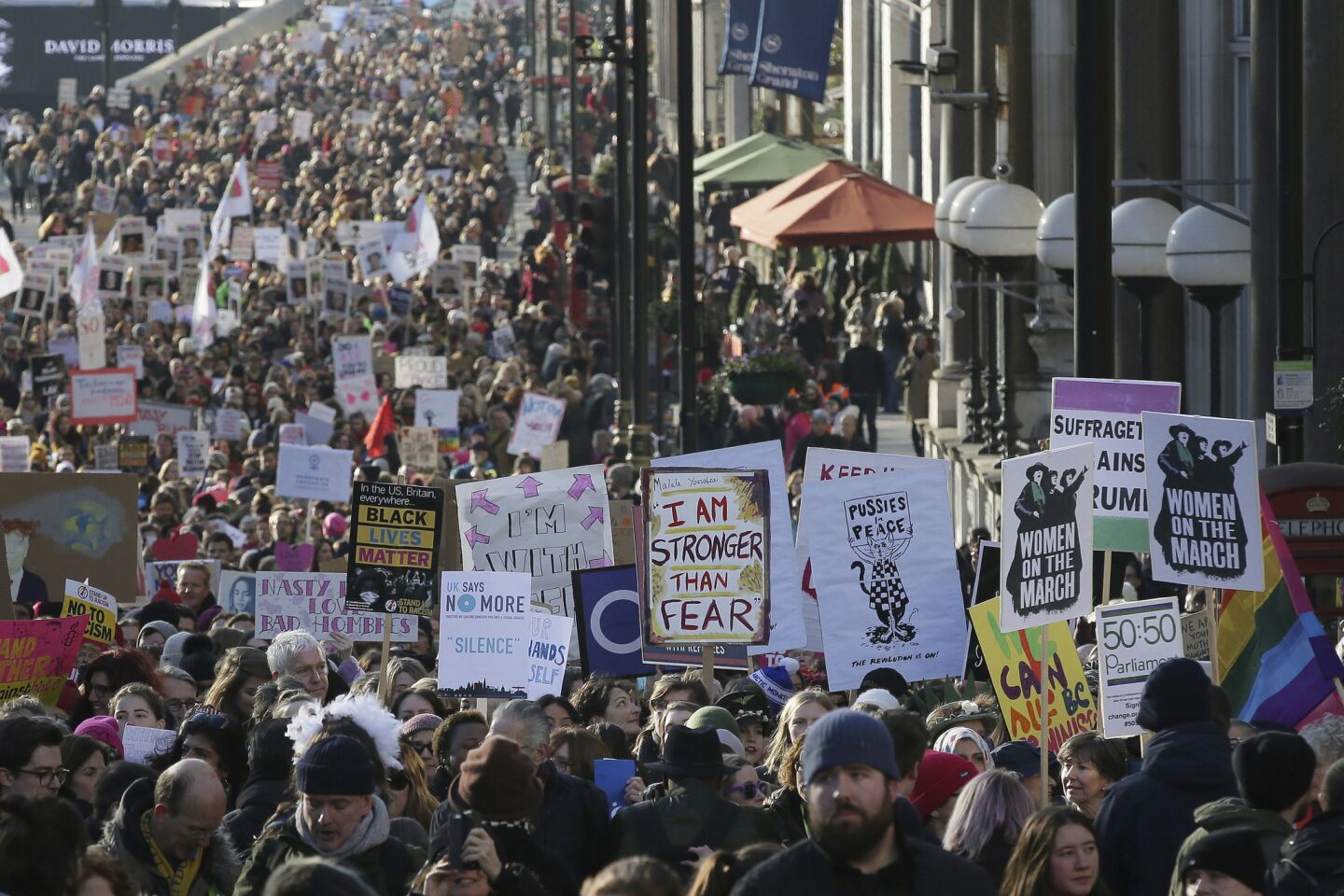 Marchers in London show their support for women's rights.