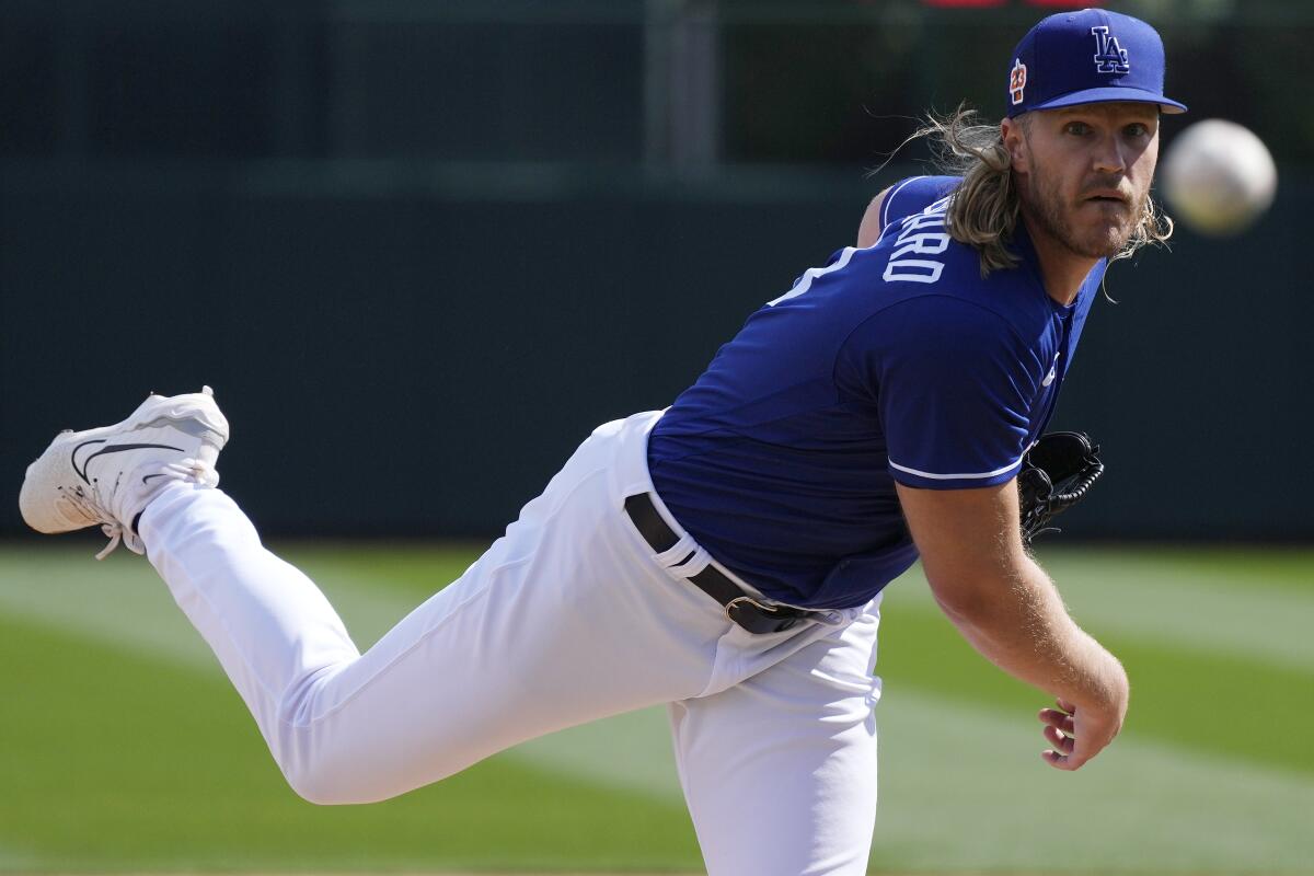 Los Angeles Dodgers pitcher Noah Syndergaard throws a ball.