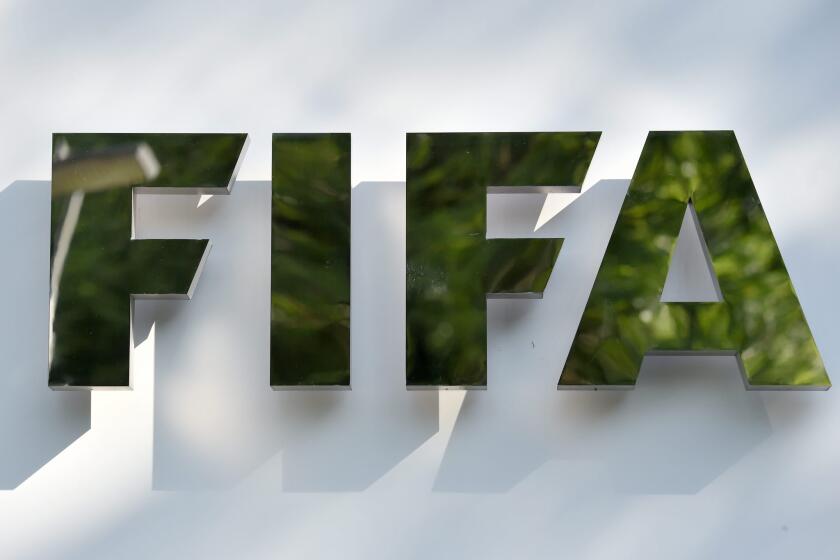 One of seven individuals arrested in Zurich and indicted as part of the U.S. Justice Department's FIFA corruption investigation has agreed to be extradited.