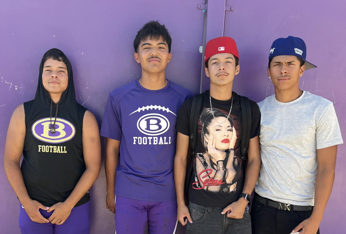 Bell High football players (from left) Jordan Medrano, Julian Campos, Joel Medrano and Manuel Pasillas pose for a photo.