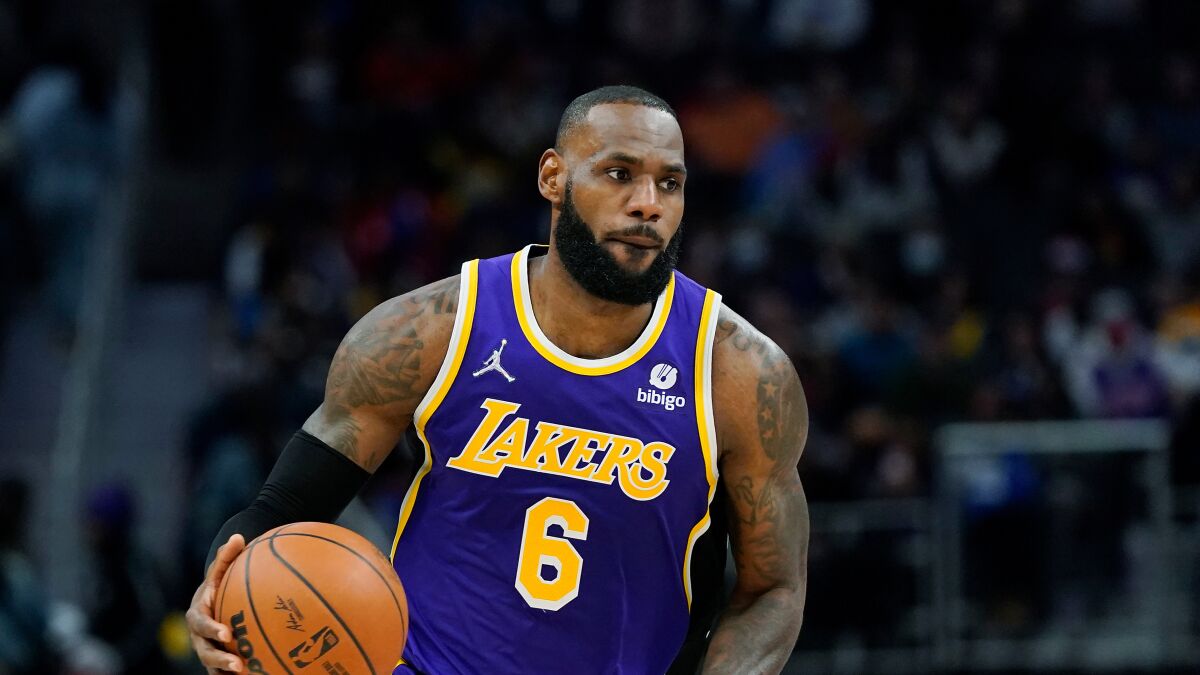 Los Angeles Lakers forward LeBron James plays during the first half.