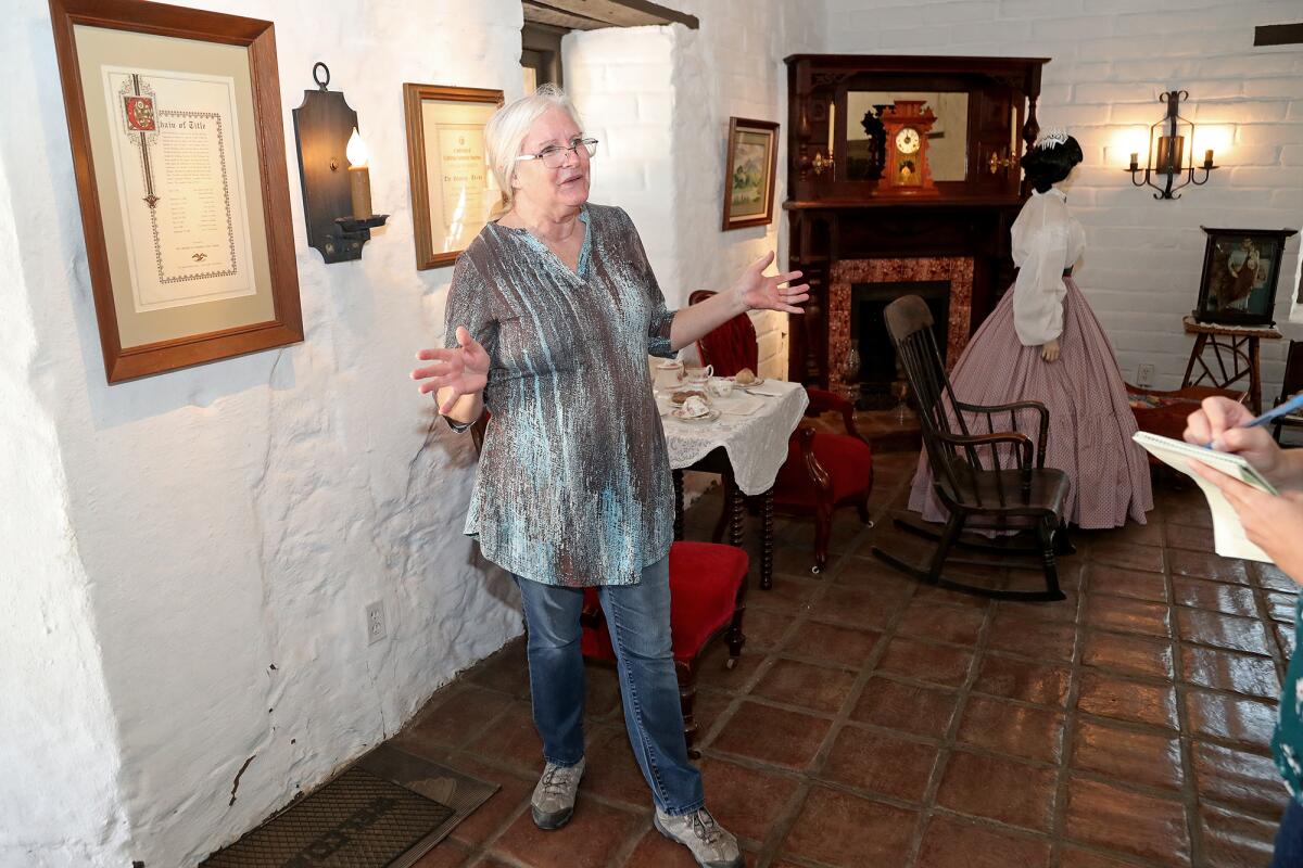 Docent Estelle Sewell Hughes discusses the history of the Diego Sepulveda Adobe at Estancia Park on Thursday.