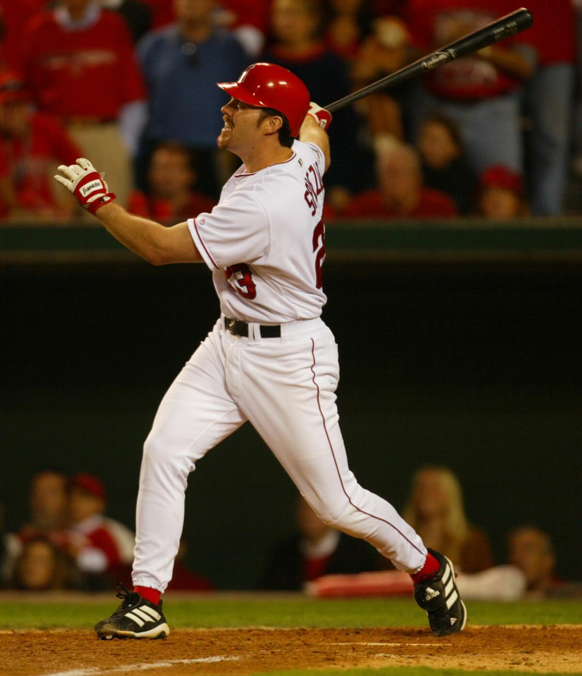 Scott Spiezio hits a three-run home run during the seventh inning in Game 6 of the 2002 World Series.