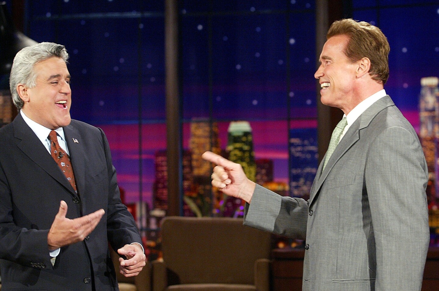 2. Republican Arnold Schwarzenegger announced his candidacy for governor on Jay Leno's "Tonight Show," catching many of his political advisors off-guard. Previously Schwarzenegger had been eying a run in 2006, the next scheduled election year. Issa, who had hoped to run, quickly stepped aside. This Oct. 8, 2003, photo shows Leno and Gov.-elect Schwarzenegger the day after the recall election.