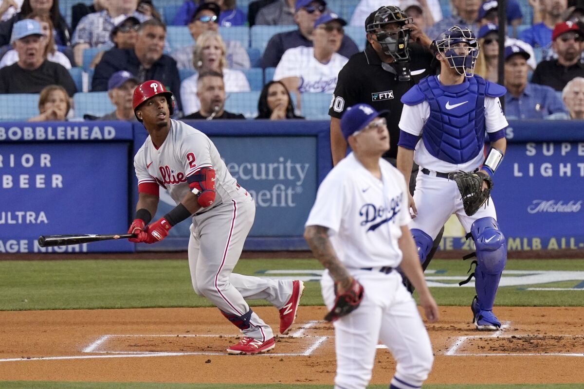 Philadelphia's Jean Segura hits a three-run home run off Dodgers starting pitcher Julio Urías in the first inning Saturday.