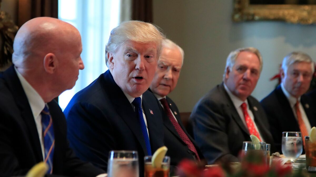 President Trump met with GOP lawmakers working on the tax bill Wednesday: From left, House Ways and Means Chairman Kevin Brady of Texas, Sen. Orrin Hatch of Utah, Rep. John Shimkus of Illinois and Rep. Fred Upton of Michigan.