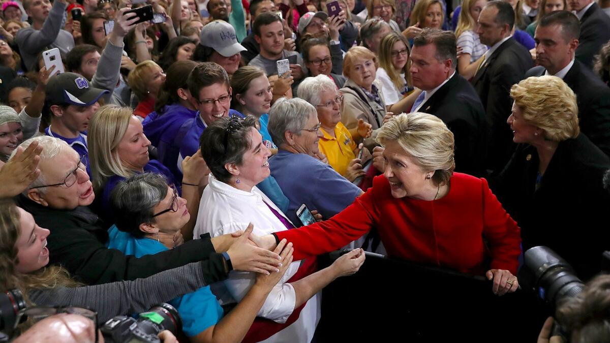 Democratic presidential candidate Hillary Clinton greets supporters. A Democrat-affiliated group called the Indiana Voter Registration Project is being investigated by state police, who say they have found evidence of fraud but have not provided details.