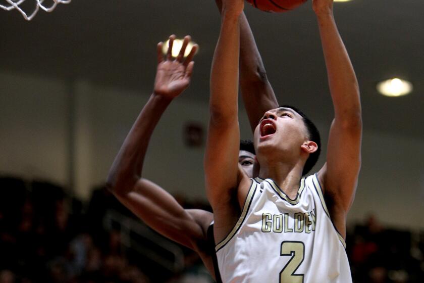 St. Francis player Andre Henry takes the hoop and scores in the CIF SS Div. 2AA Basketball Finals vs. Santa Clarita Christian, at Azusa Pacific University in Azusa on Saturday, Feb.29, 2020. SFHS came up short 61-39.