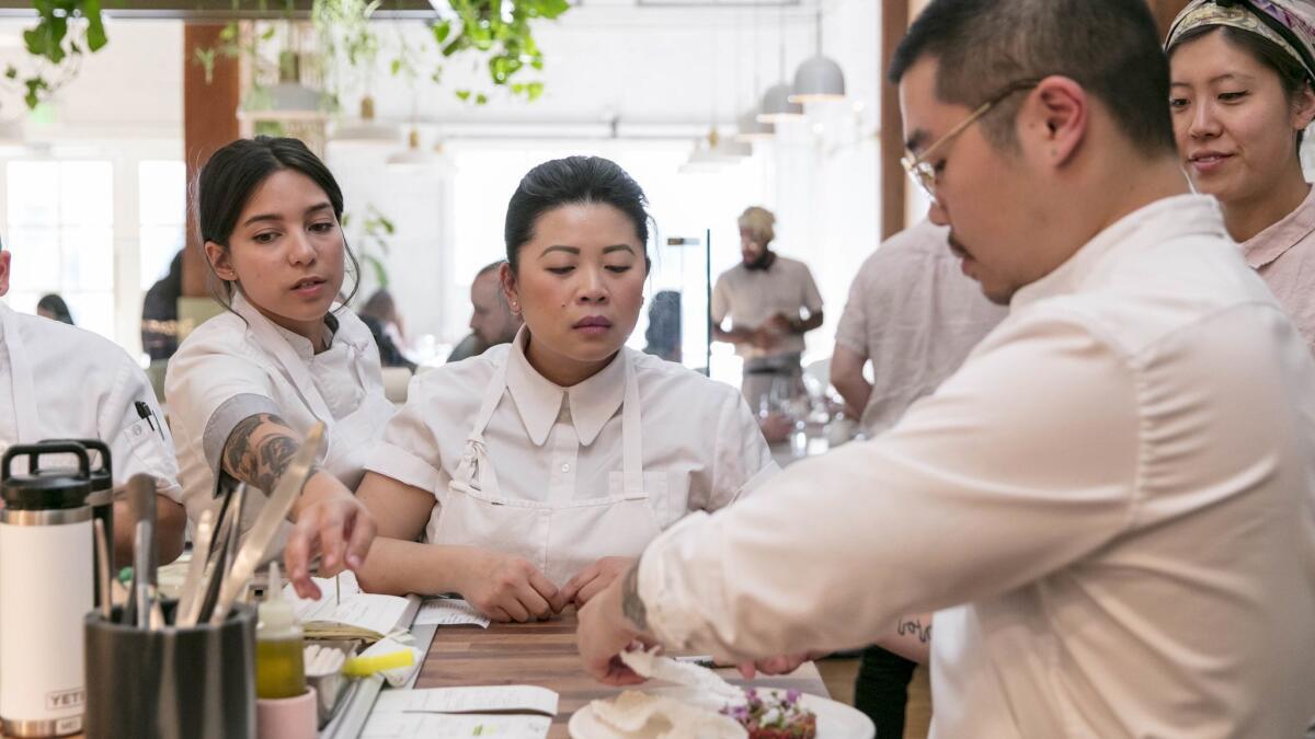 Chef and owner of Nightshade, Mei Lin, works with her crew during dinner service at her new downtown Los Angeles restaurant.