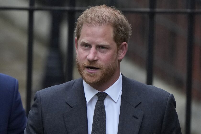 Britain's Prince Harry arrives at the Royal Courts Of Justice in London, Tuesday, March 28, 2023. Prince Harry is in a London court on Tuesday as the lawyer for a group of British tabloids prepared to ask a judge to toss out lawsuits by the prince, Elton John and several other celebrities who allege phone tapping and other invasions of privacy.(AP Photo/Alastair Grant)