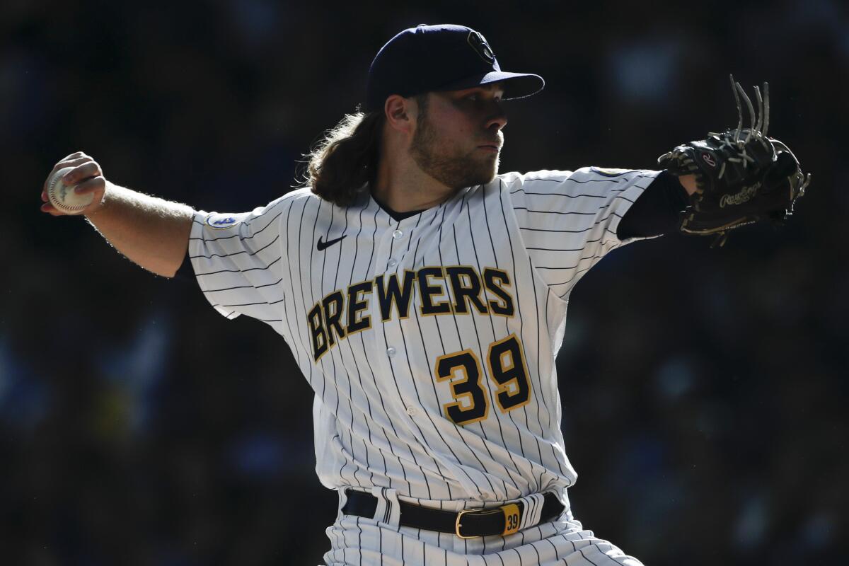 Brewers starting pitcher Corbin Burnes throws against the Atlanta Braves on Oct. 8, 2021.